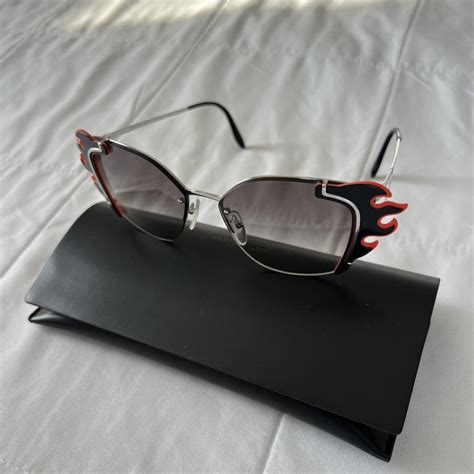 prada sunglasses flames|Prada sunglasses cost.